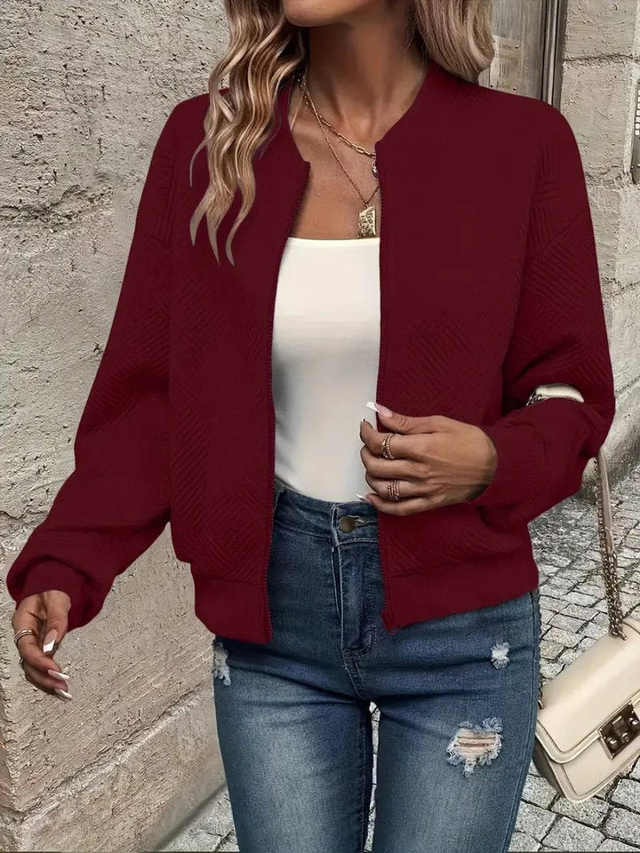 Burgundy quilted cropped bomber jacket with ribbed cuffs and hem