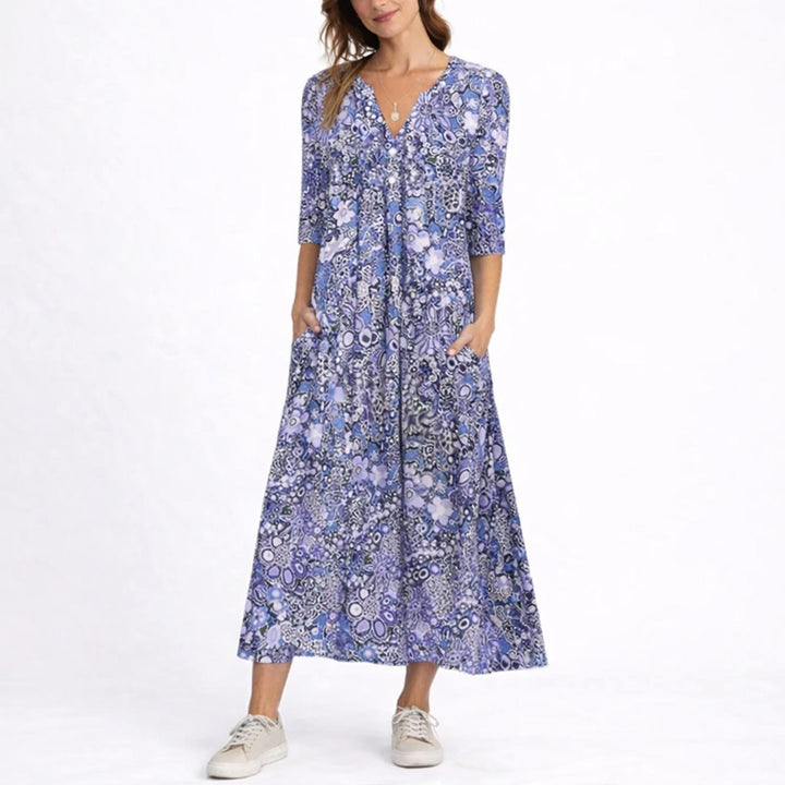 purple floral midi dress with V-neck and three-quarter sleeves on model