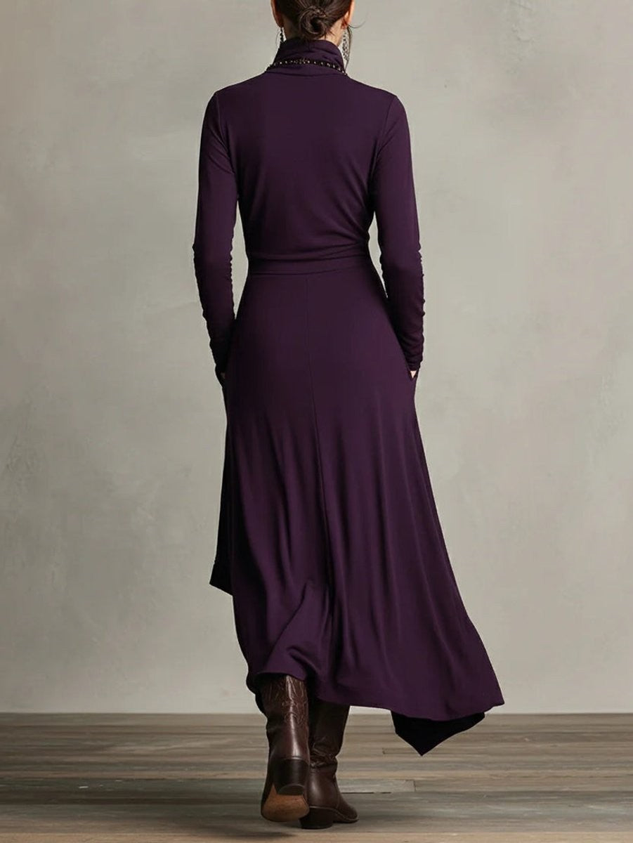 Back view of plum turtleneck maxi dress with flowing asymmetric hem