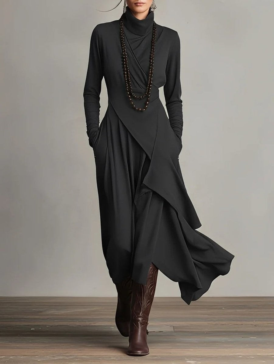 Black turtleneck maxi dress featuring layered asymmetric skirt and long sleeves
