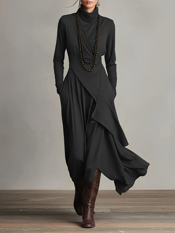 Black turtleneck maxi dress featuring layered asymmetric skirt and long sleeves