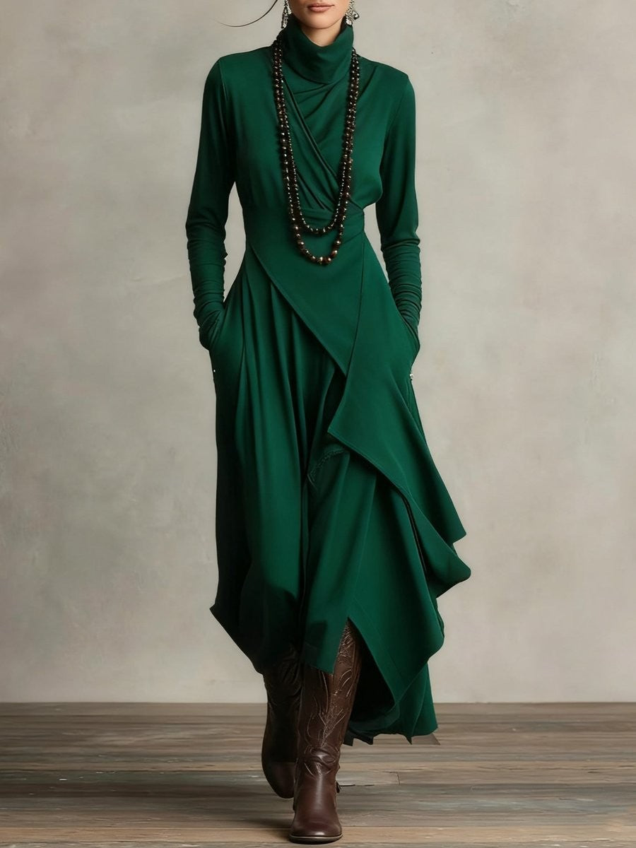 Emerald green turtleneck maxi dress featuring layered asymmetric hemline