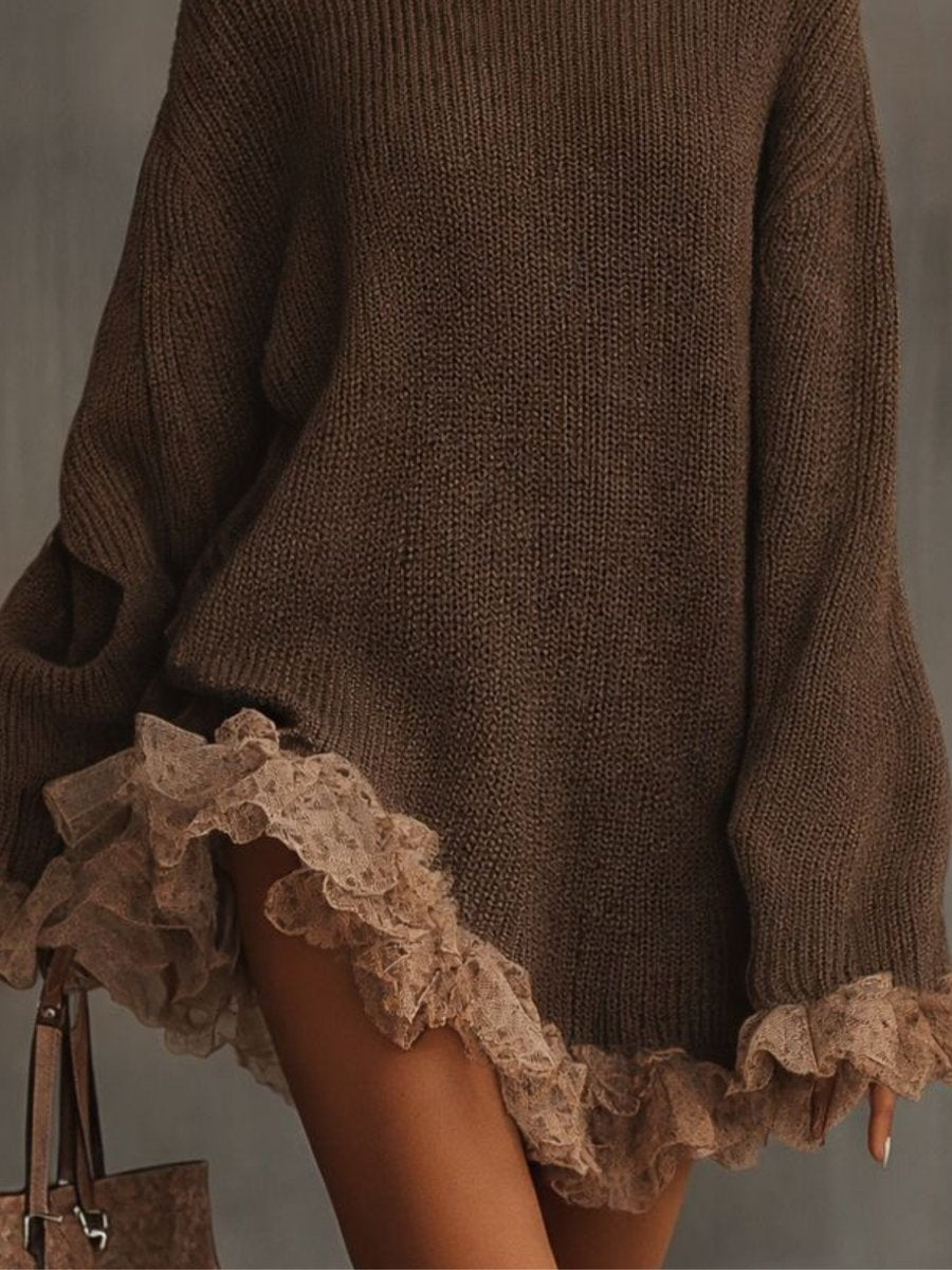 Close-up of oversized knit dress hem with delicate brown lace trim