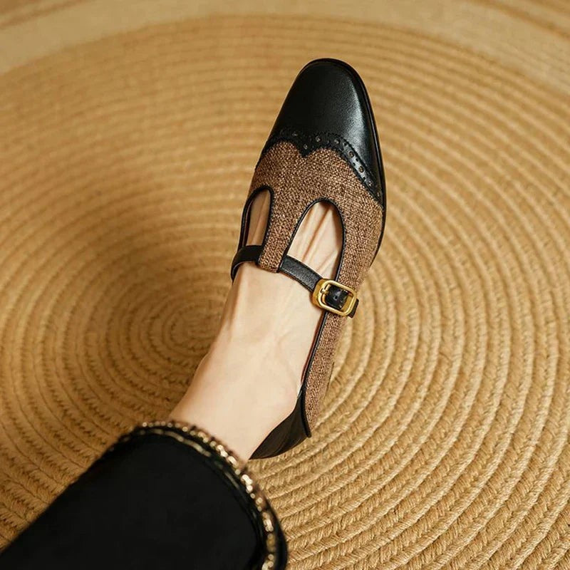 two-tone T-strap Mary Jane shoe with wingtip brogue toe and low heel