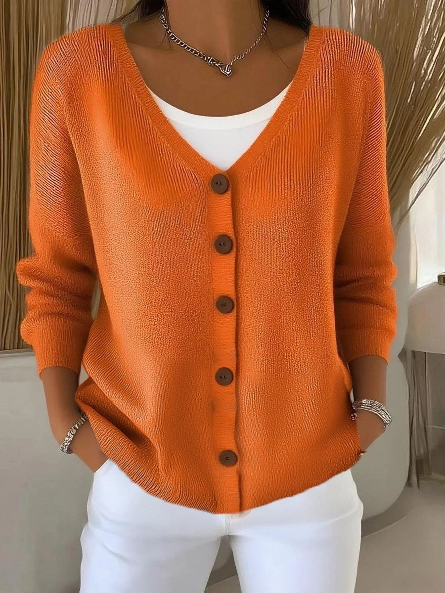 Orange V-neck button-front knit cardigan sweater with long sleeves