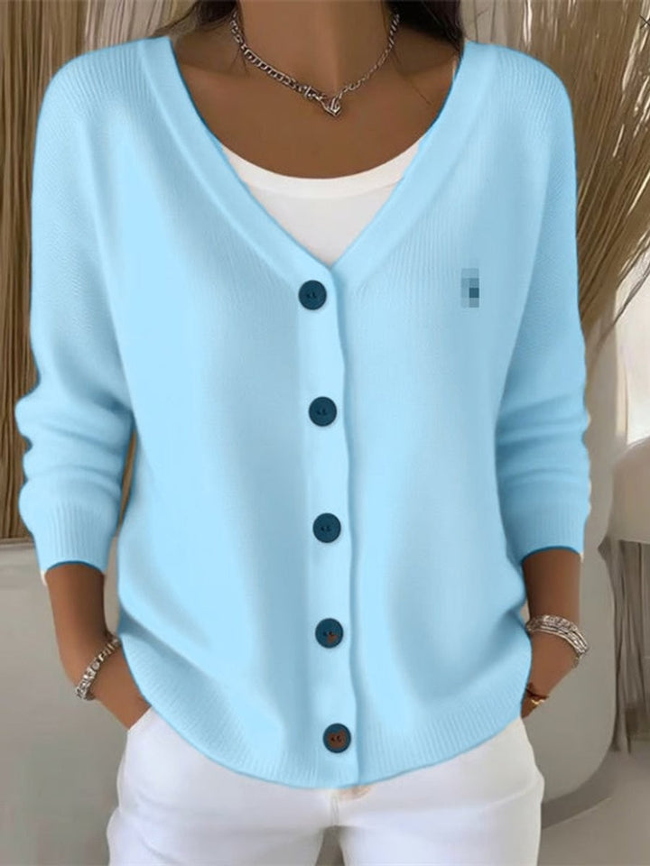Light blue V-neck button-front knit cardigan sweater with contrast buttons