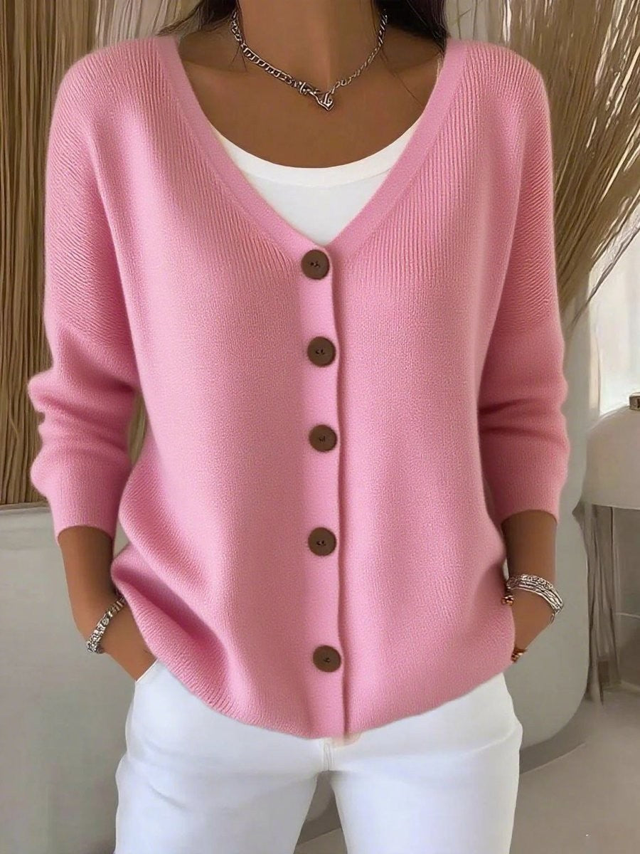 Pink V-neck button-front knit cardigan sweater with long sleeves