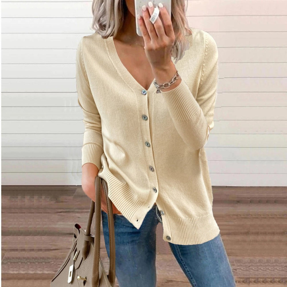 Cream V-neck button-front knit cardigan with long sleeves and side slits