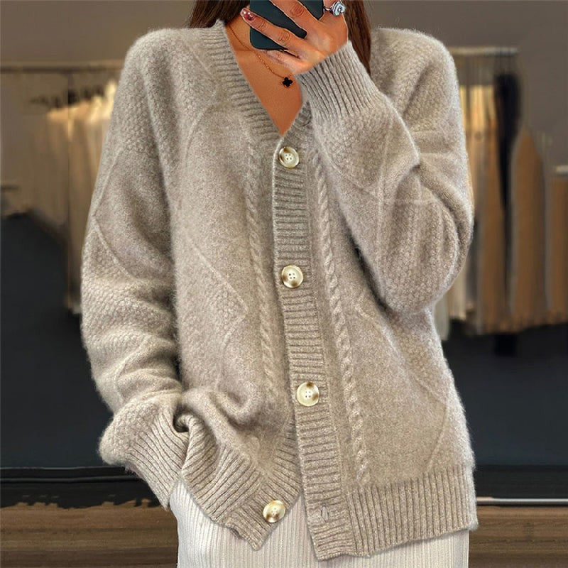 Taupe cable-knit cardigan featuring ribbed cuffs and button-front detail
