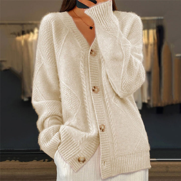 Cream cable-knit cardigan with oversized fit and V-neck buttons
