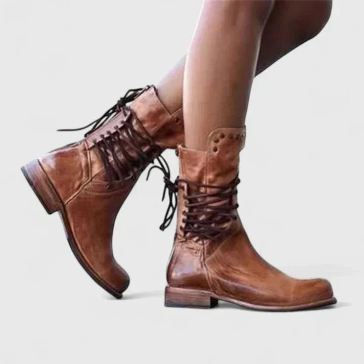 Tan leather lace-up boots featuring studded collar and stacked block heel