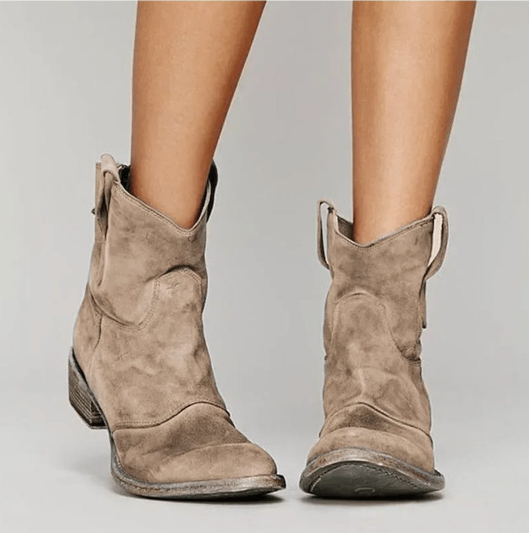 Taupe suede western ankle boots featuring stacked flat heel