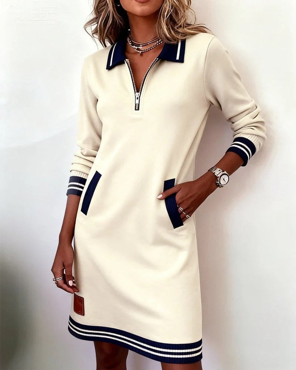Tan zip-up polo collar dress featuring striped cuffs and pockets